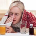 Sick Woman with Tissue and Cold Remedies