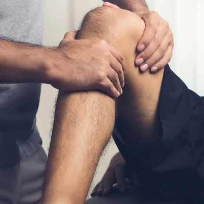 Physical Therapist Treating Knee