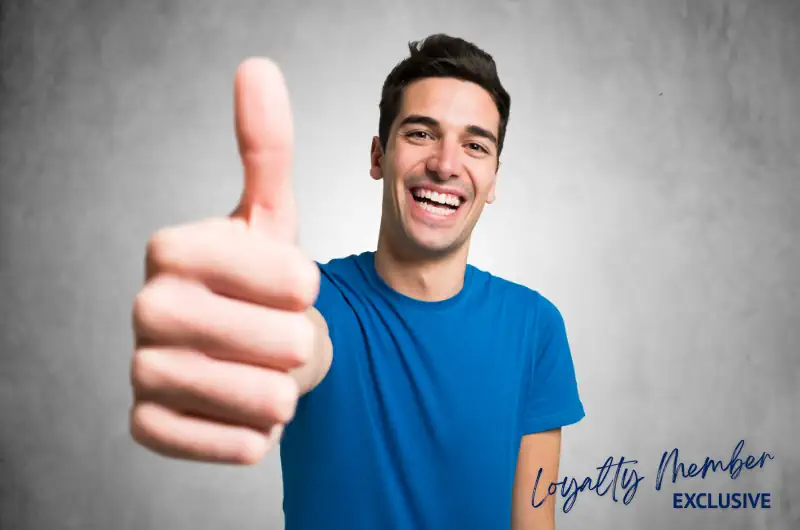 Happy man with thumbs up. 