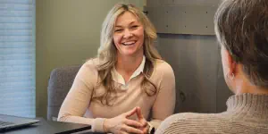 Katie speaking to wellness client